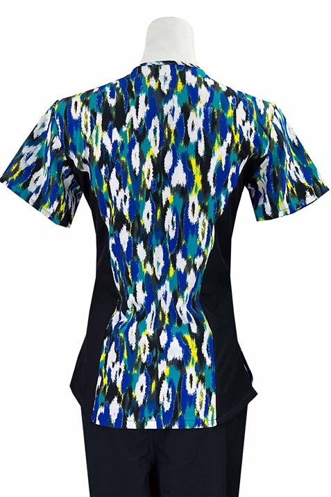 An Essentials Women's Zip Neck Scrub Top in "Royal Abstract" featuring 2 front patch pockets for all of you on the go storage needs.
