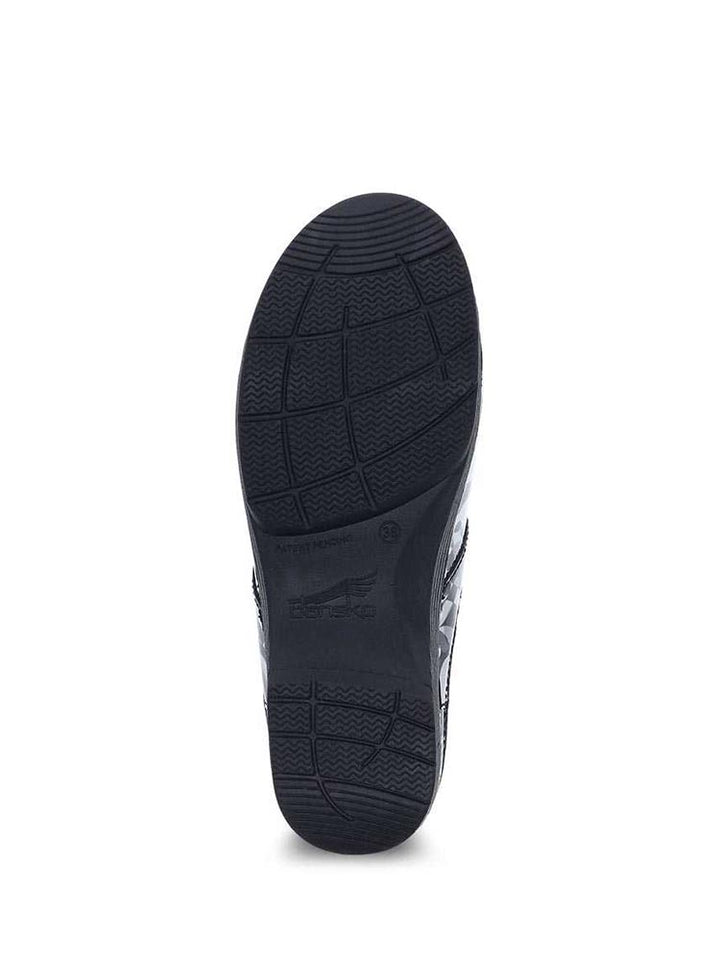 Bottom view of a Dansko LT Pro Nurse Shoe in Twisty Patent featuring a roomy, reinforced toe.