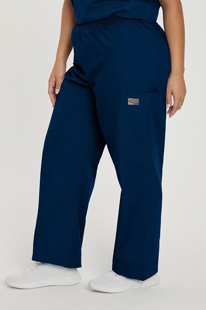 A young female Dental Hygienist wearing A Landau ScrubZone Women's Elastic Waist Cargo Scrub Pant in True Navy size 2XL featuring a a sleek, straight leg for a flattering fit.