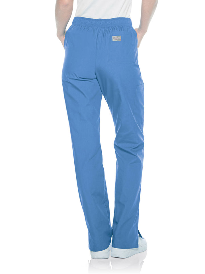 Female nurse wearing a pair of Landau Scrub Zone Women's Straight Leg Cargo Pants in ceil featuring a modern tailored fit.