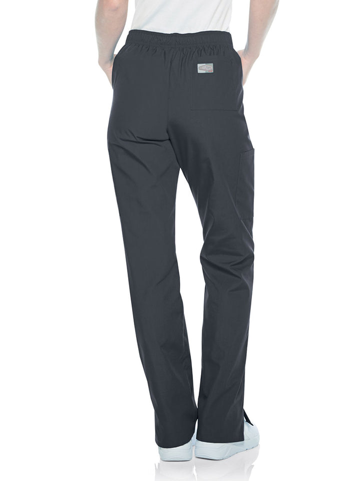 Female nurse wearing a pair of Landau Scrub Zone Women's Straight Leg Cargo Pants in graphite featuring a modern tailored fit.