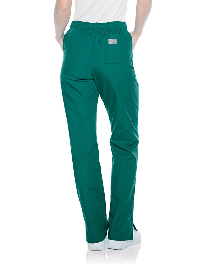 Young female healthcare professional wearing a pair of Landau Scrub Zone Women's Straight Leg Cargo Pants in hunter featuring a total of 5 pockets.