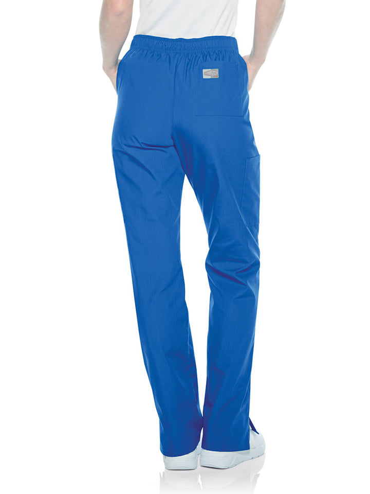 Female nurse wearing a pair of Landau Scrub Zone Women's Straight Leg Cargo Pants in royal featuring a modern tailored fit.