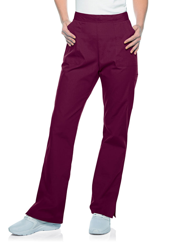 Young woman wearing a pair of Landau Scrub Zone Women's Straight Leg Cargo Pants in wine.