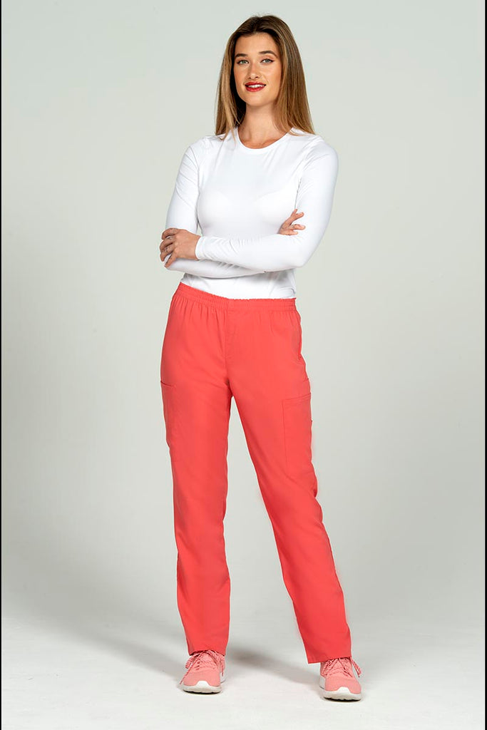 A full body image of a female Nurse Practitioner wearing an Epic By MedWorks Women's Elastic Waist Scrub Pant in Coral size XL featuring a total of 4 pockets.