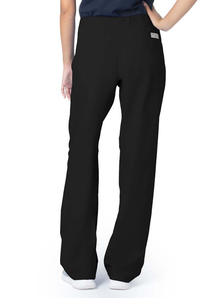 Young lady wearing a pair of Urbane Essentials Women's Straight-Leg Pants in "Black" featuring a high-rise full drawstring waist.