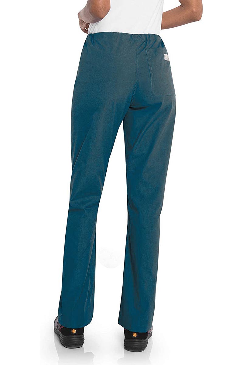 Female healthcare professional wearing a pair of Urbane Essentials Women's Straight-Leg Pants in "Caribbean Blue'" featuring 1 back patch pocket.