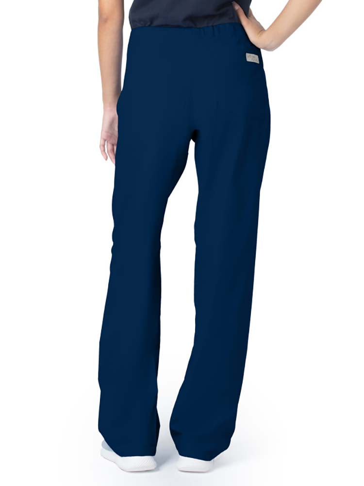 Young lady wearing a pair of Urbane Essentials Women's Straight-Leg Pants in "Navy" featuring a high-rise full drawstring waist.