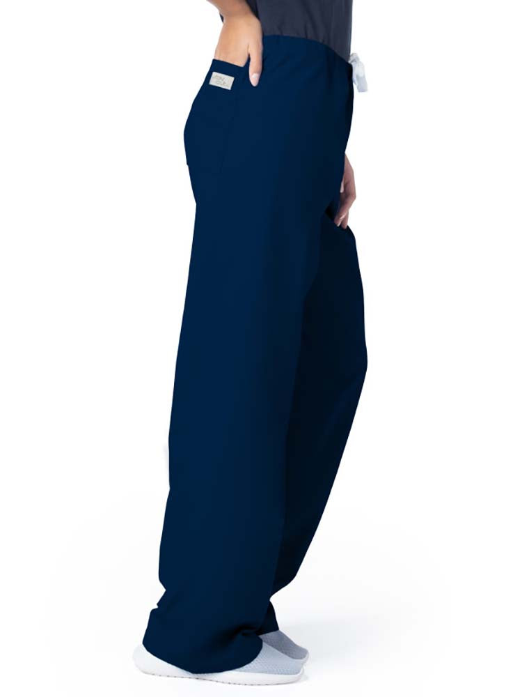 Female healthcare professional wearing a pair of Urbane Essentials Women's Straight-Leg Pants in "Navy'" featuring 1 back patch pocket.