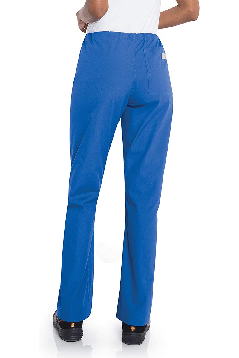 Female healthcare professional wearing a pair of Urbane Essentials Women's Straight-Leg Pants in "Royal Blue'" featuring 1 back patch pocket.