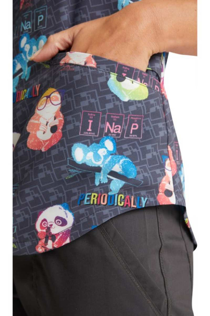 An up-close image of the left side pocket on the Cherokee Women's V-neck Print Scrub Top in "Science Friends" featuring adorable sloths, koalas & pandas.