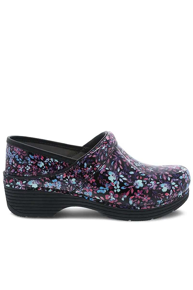 A side view of the Dansko LT Pro Nurse Shoe in "Ditsy Floral Patent" featuring a removable footbed & a leather sockliner.