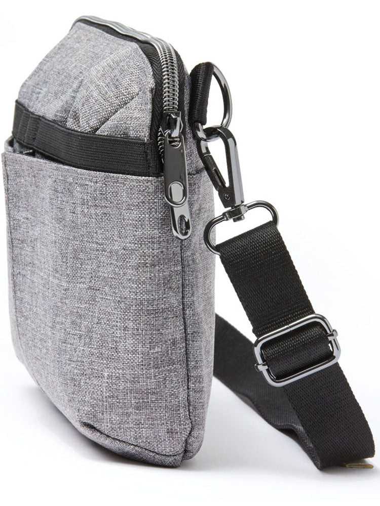 An image of the HeartSoul Convertible Utility Bag in Heather Grey featuring top zipper closure to ensure your items stored safely and securely.