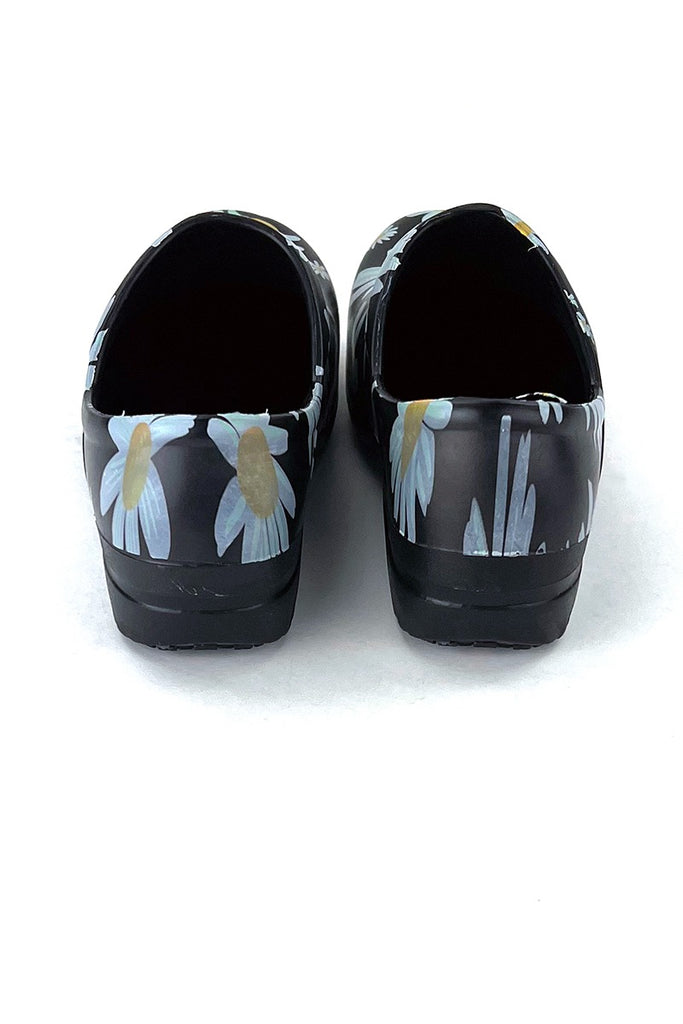 A view of the back of the StepZ Women's Slip Resistant Memory Foam Clog in "Daisy Power" size 7 featuring a classic slip-on style & a heel height of roughly 1.5".