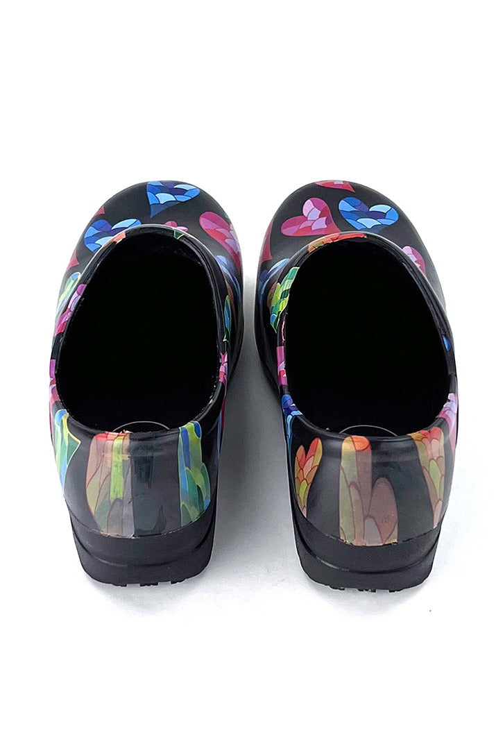 A view of the back of the StepZ Women's Slip Resistant Memory Foam Clog in "Mosaic Love" size 7 featuring a classic slip-on style & a heel height of roughly 1.5".