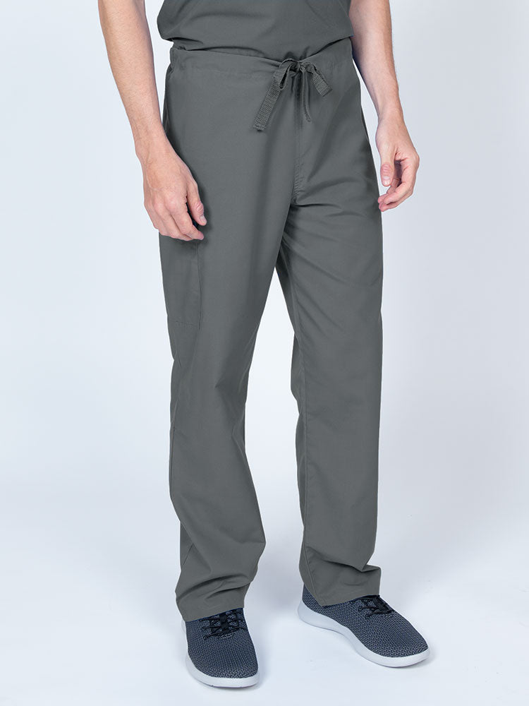 Man wearing a Luv Scrubs Unisex Drawstring Cargo Pant in pewter with an inseam of 31".