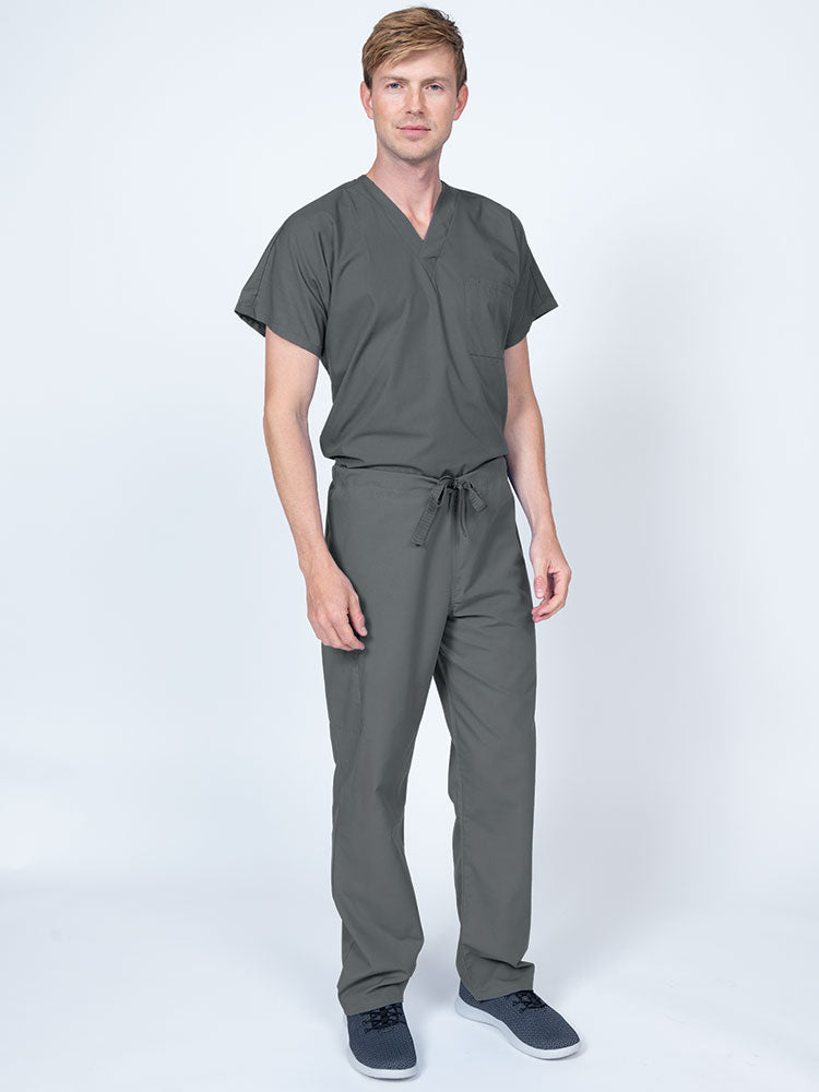 Man wearing a Luv Scrubs Drawstring Cargo Pant in pewter featuring a unisex fit.