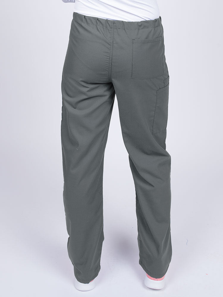 Woman wearing a Luv Scrubs Unisex Drawstring Cargo Pant in pewter with one back pocket on the wearer's right side.