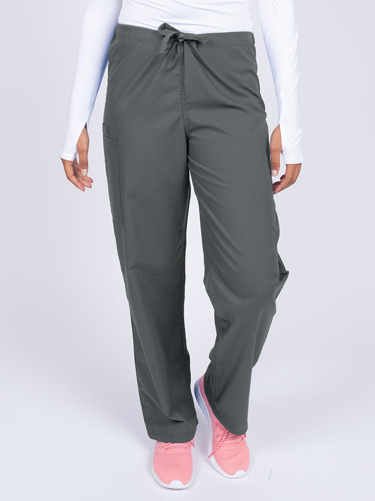 Young nurse wearing a Luv Scrubs Unisex Drawstring Cargo Pant in pewter with a total of 3 pockets.