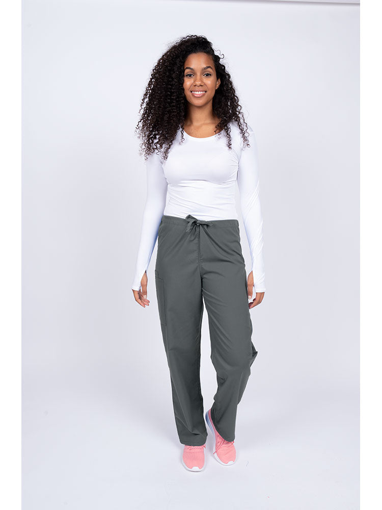 Young nurse wearing a Luv Scrubs Unisex Drawstring Cargo Pant in pewter with drawstring waist.