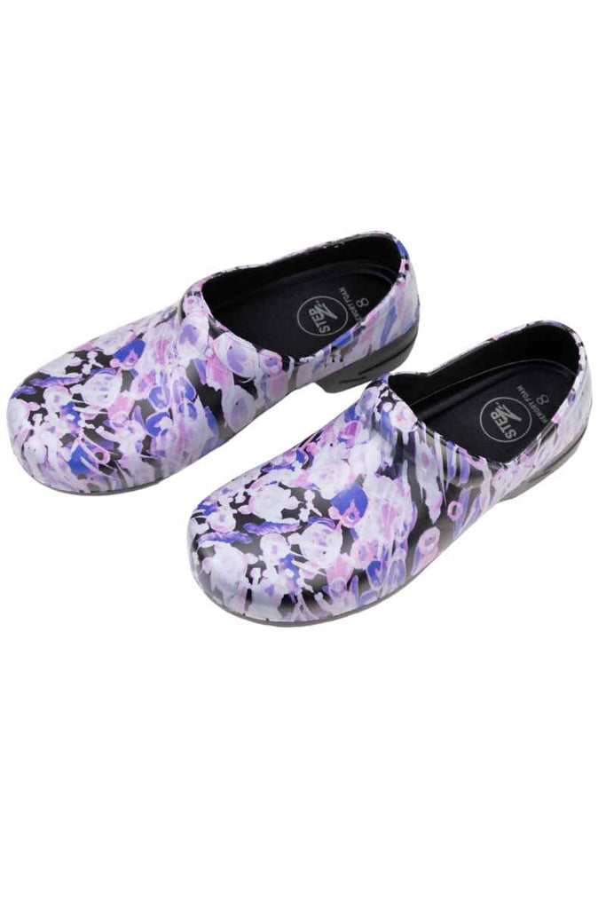 A picture of the side of a StepZ Women's Slip Resistant Nurse Clogs in "Lilac Dreams" size 8 featuring a heel height of 1.5".