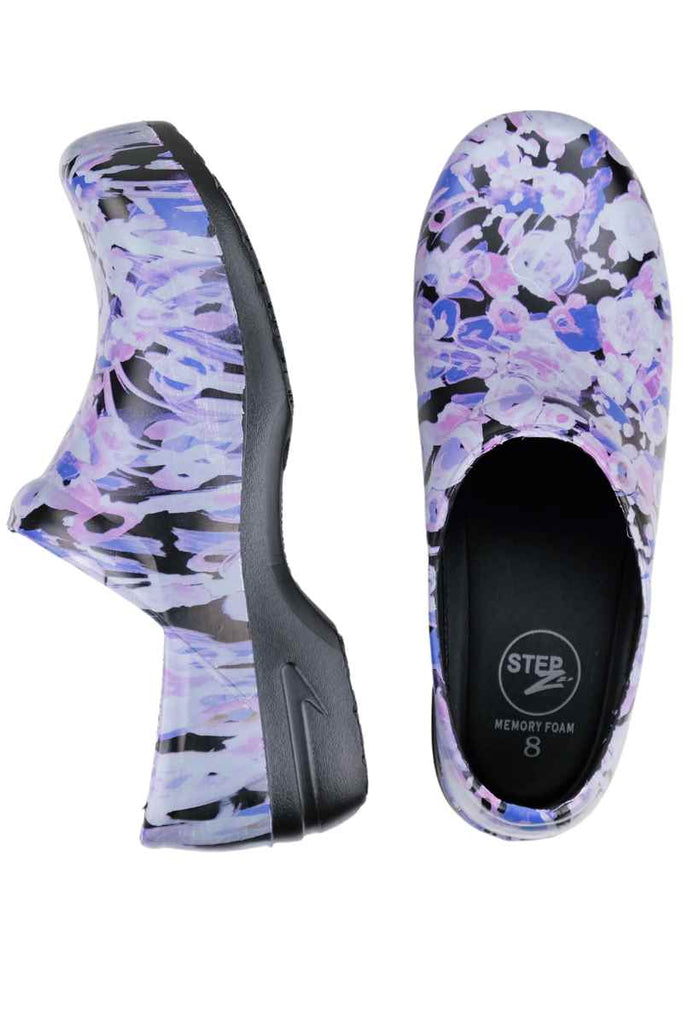 An image of the side & top of the StepZ Women's Slip Resistant Nurse Clog in "Lilac Dreams" size 10 featuring a classic slip on style.