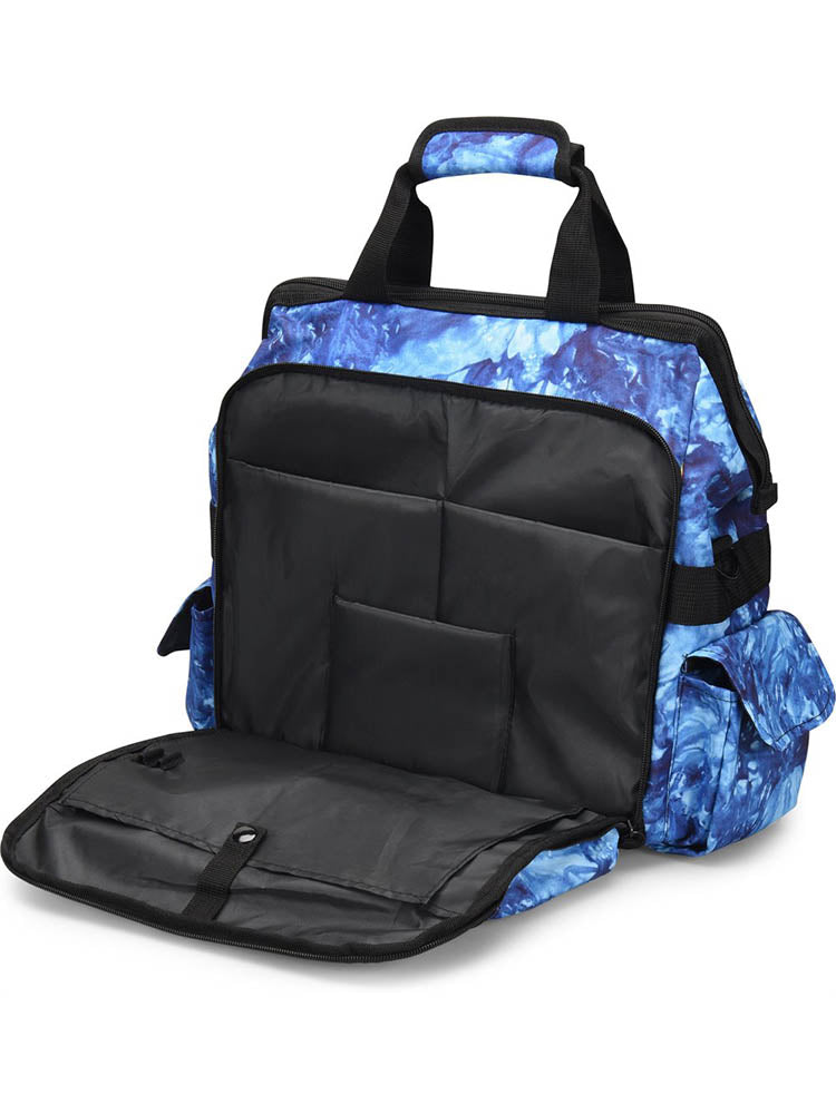 A frontward facing image of the Nurse Mates Ultimate Medical Bag in "Blue Crystals Tie Dye" featuring a padded laptop compartment.