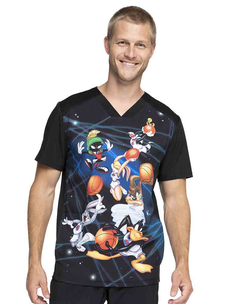 Young male nurse wearing a Uniexc V-neck Print Scrub Top from Cherokee Tooniforms in "Space Jam" featuring contrast piping at the neckline.