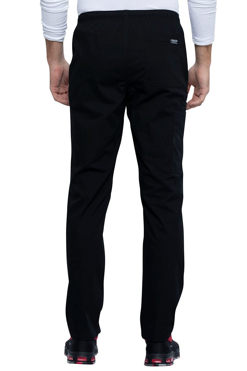 A backward facing image of the Cherokee Unisex Straight Leg Drawstring Scrub Pant in Black size XL featuring 1 back patch pocket on the wearer's left side.