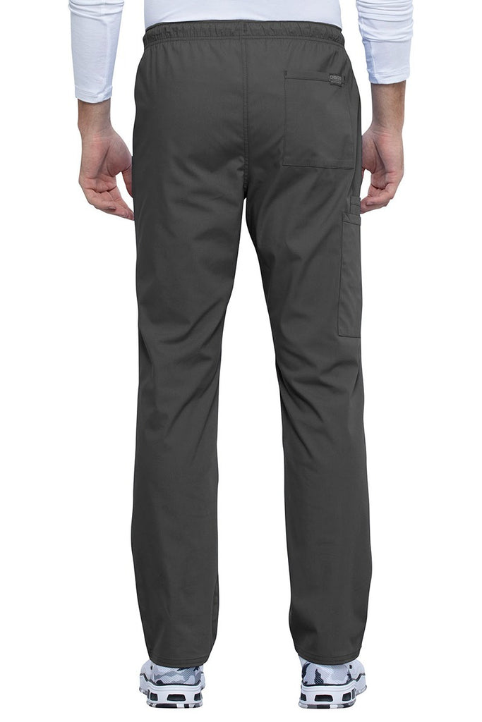 A backward facing image of the Cherokee Unisex Straight Leg Drawstring Scrub Pant in Pewter size XL featuring  1 back patch pocket on the wearer's left side.