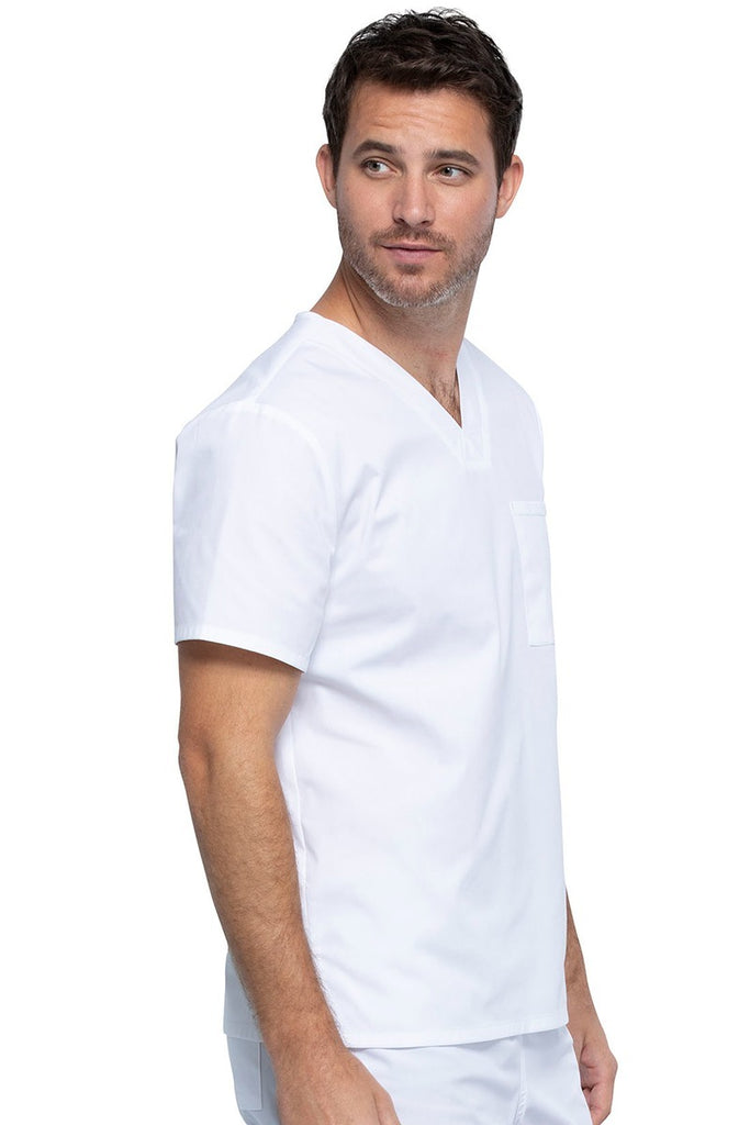 A picture of a young Male Phlebotomist wearing a Cherokee Unisex Tuckable V-neck Scrub Top in White size Large featuring pull-on closure.