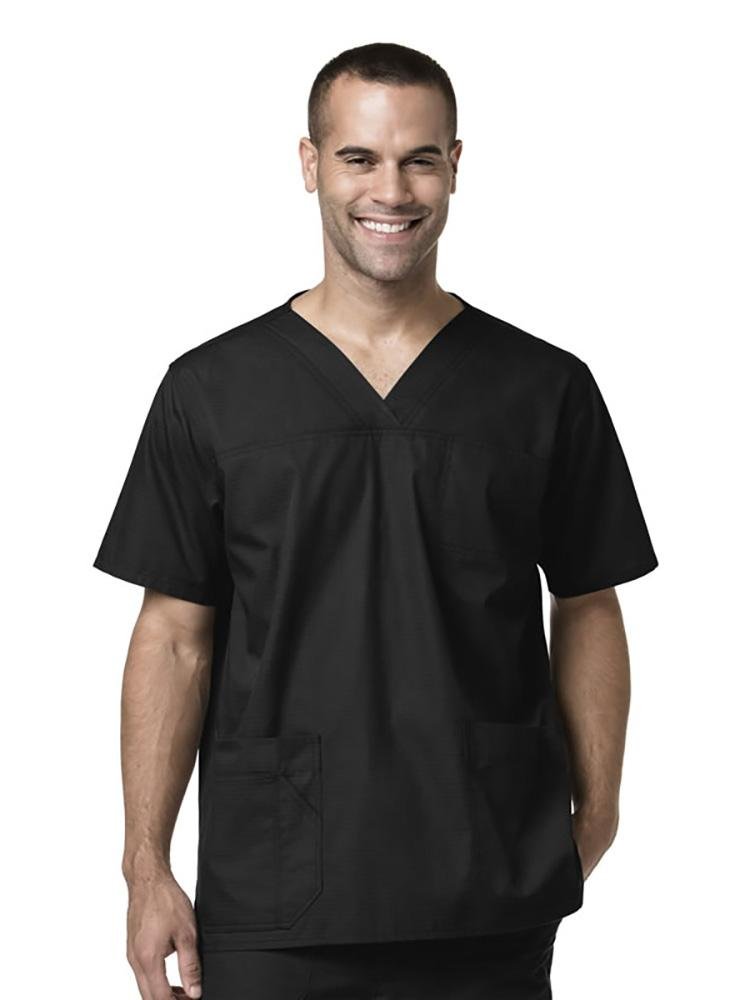 A male Home Health Aide wearing a Carhartt Men's Ripstop Multi-Pocket Scrub Top in black size 3X featuring a V-neckline & short sleeves.