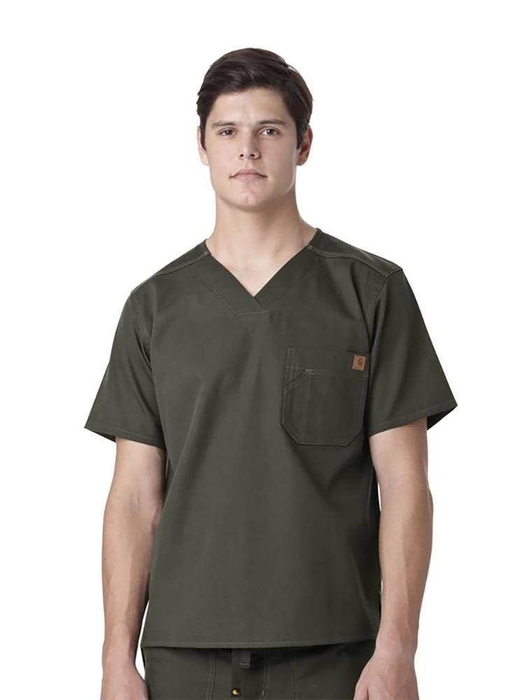A male Surgeon wearing a Carhartt men's Ripstop Utility Scrub Top in olive size medium featuring a pleated bi-swing back for extra stretch across the shoulders.