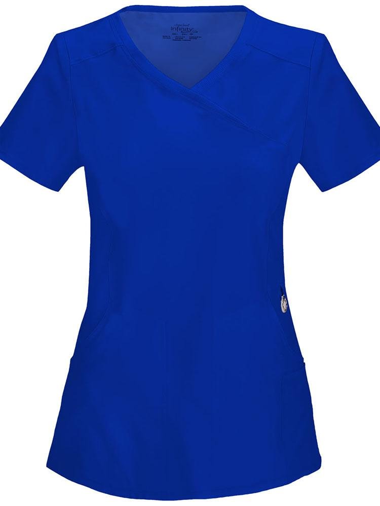 A frontward facing image of a Cherokee Infinity Women's Antimicrobial Mock Wrap Top in galaxy blue size medium featuring antimicrobial fabric with spandex for stretch.
