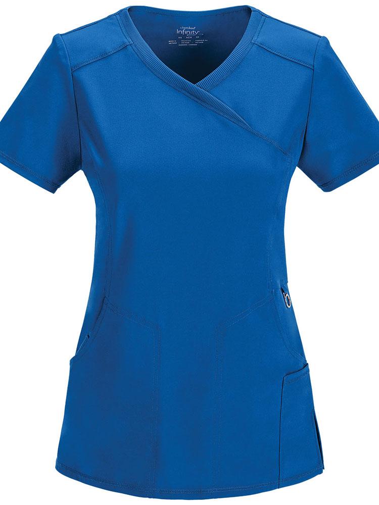 A frontward facing image of the Cherokee Infinity Women's Antimicrobial Mock Wrap Top in royal featuring a Contemporary fit with two set-in front pockets.
