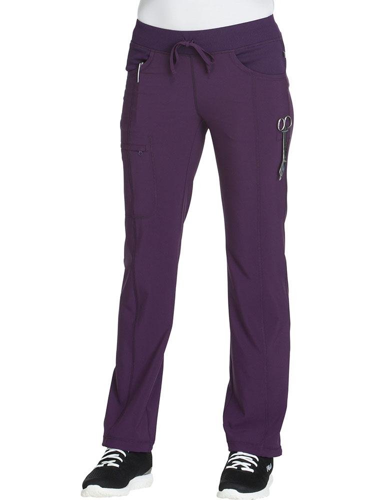 A young attending physician Cherokee Infinity Women's Low-Rise Straight Leg Scrub Pant in eggplant featuring super stretchy rib knit fabric.