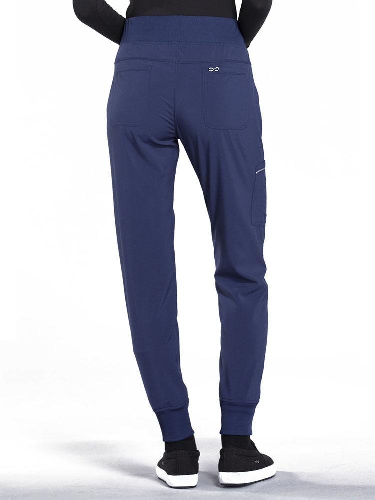 Cherokee Infinity Women's Mid Rise Tapered Jogger in navy featuring 2 back patch pockets. 