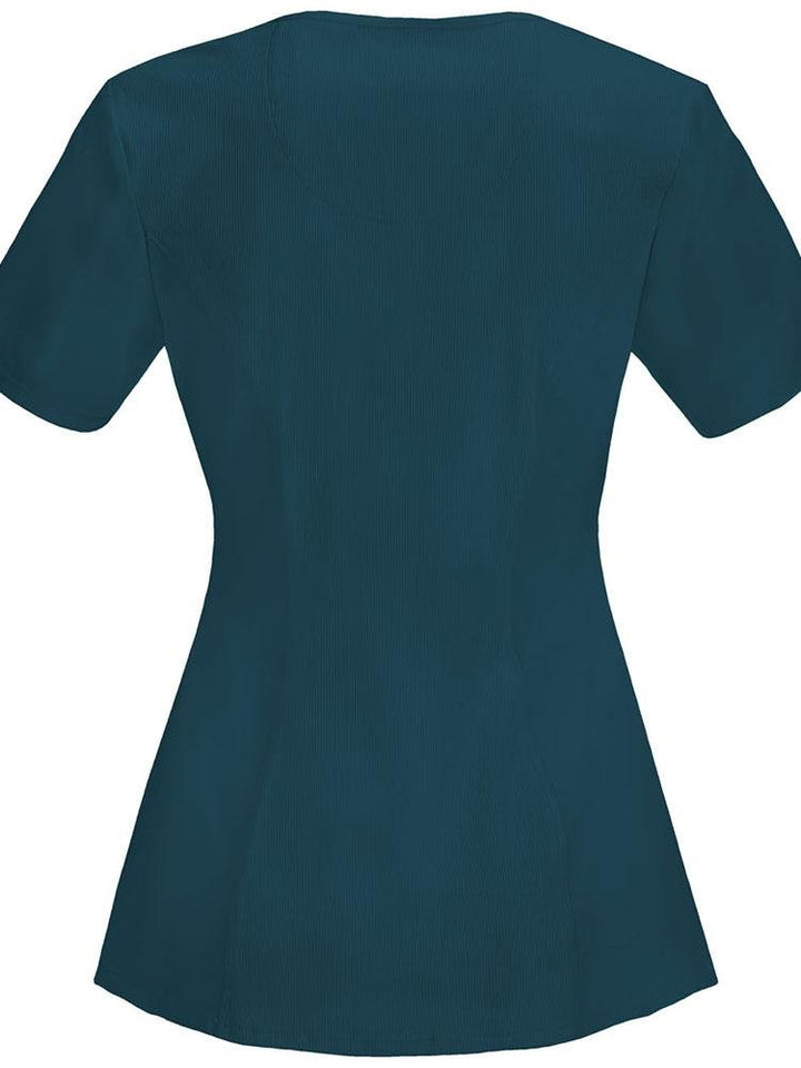 An image of the back of the Cherokee Infinity Women's Round Neck Scrub Top in Caribbean size 2XL featuring stretch rib knit at the center back panel.