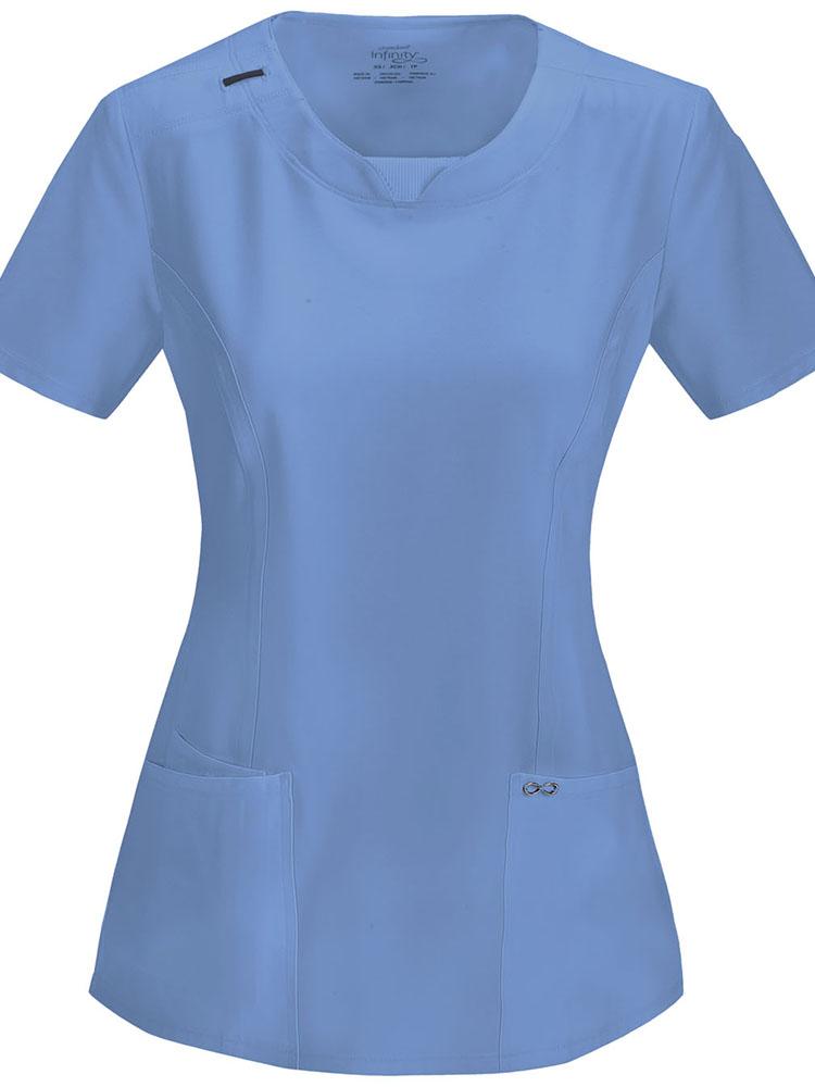 A frontward facing image of the Cherokee Infinity Women's Round Neck Scrub Top in ceil size 3XL featuring Antimicrobial easy care fabric.