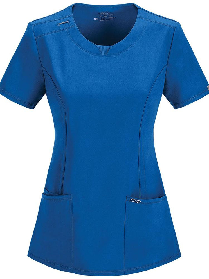 A frontward facing image of the Cherokee Infinity Women's Round Neck Scrub Top in Royal size 2XL featuring 2 patch pockets & 1 interior pocket.