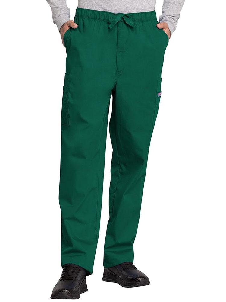A young male Health Information Technician wearing a Cherokee Workwear Originals Men's Drawstring Cargo Scrub Pant in Hunter size Large featuring an elastic waistband with a webbed drawstring.