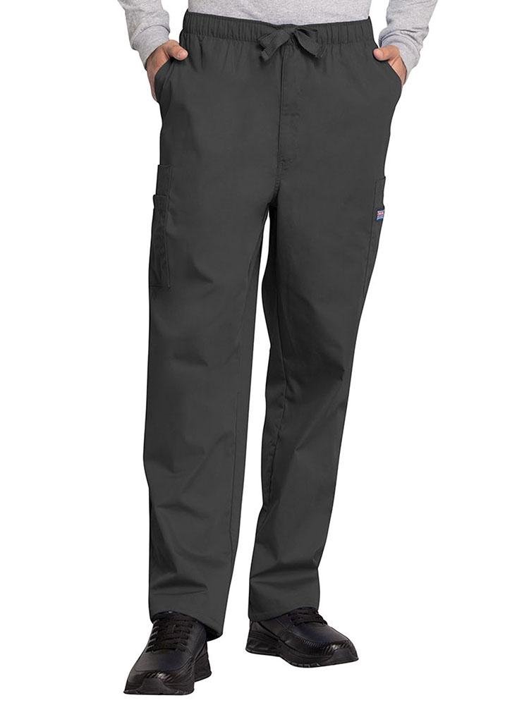 A young male Cardiovascular Technologist wearing a Cherokee Workwear Originals Men's Drawstring Cargo Scrub Pant in Pewter size Large featuring an elastic waistband with a webbed drawstring.