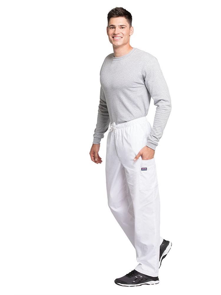 A male Nursing Assistant wearing a Cherokee Workwear Originals Men's Drawstring Cargo Scrub Pant in White size Medium featuring 2 front slash pockets & a functional zip fly.