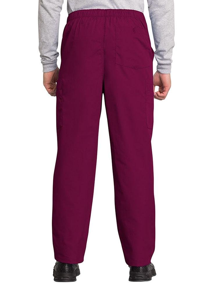 A male Physical Therapy Assistant wearing a Cherokee Workwear Originals Men's Drawstring Cargo Scrub Pant in Wine size 2XL featuring 1 back patch pocket & 4 side cargo pockets.