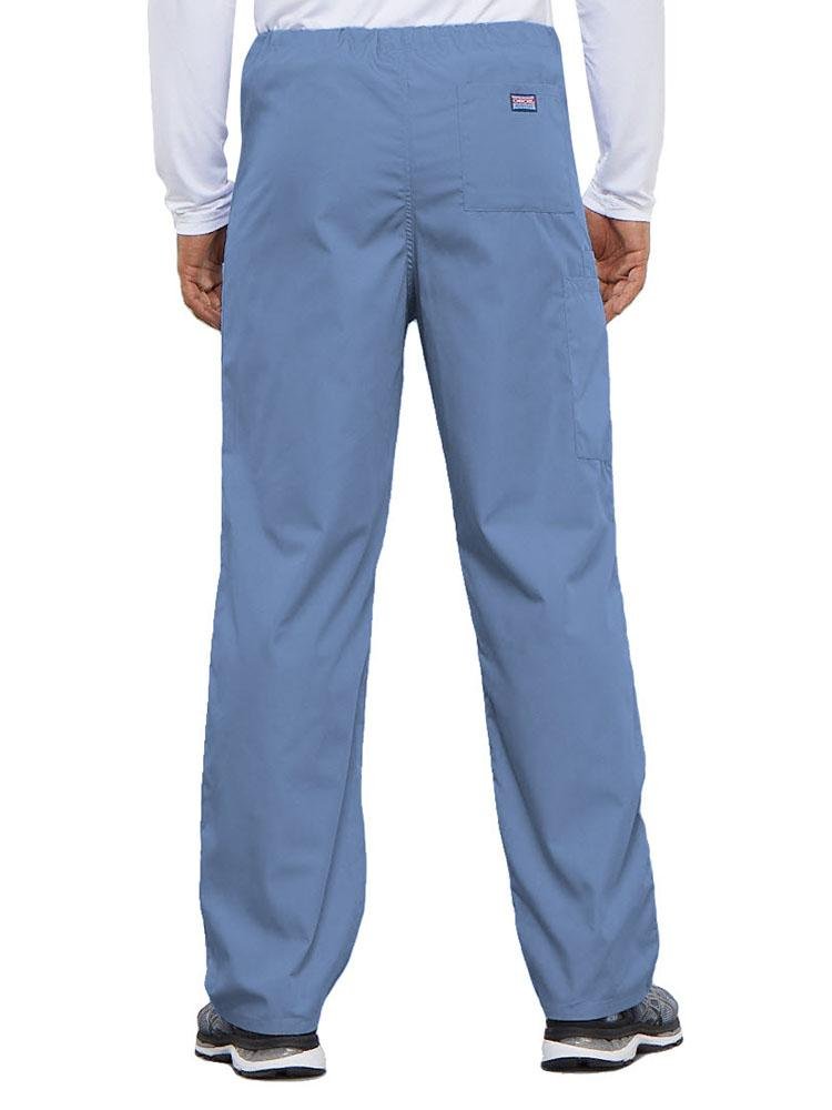 A young male Physical Therapist wearing a Cherokee Workwear Originals Unisex Drawstring Cargo Scrub Pant in Ceil featuring 1 back pocket.