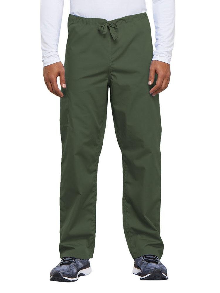 A young male Nurse Practitioner wearing a Cherokee Workwear Originals Unisex Drawstring Cargo Scrub Pant in Olive size Medium Short featuring a total of 3 pockets.