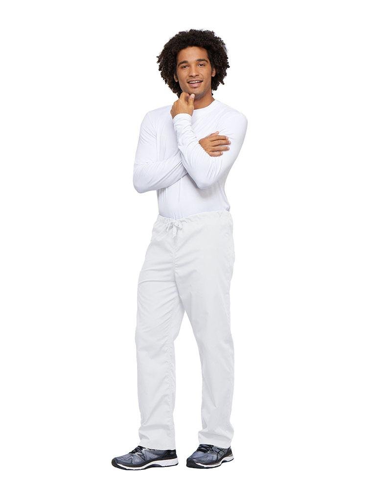 A young male Nurse wearing a Cherokee Workwear Unisex Drawstring Cargo Pant in White size 4XL featuring an inseam of 31".
