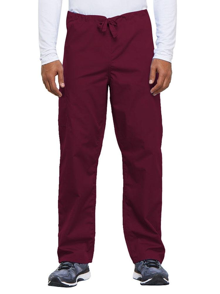 A young male Nurse Practitioner wearing a Cherokee Workwear Originals Unisex Drawstring Cargo Scrub Pant in Wine size Medium Short featuring a total of 3 pockets.