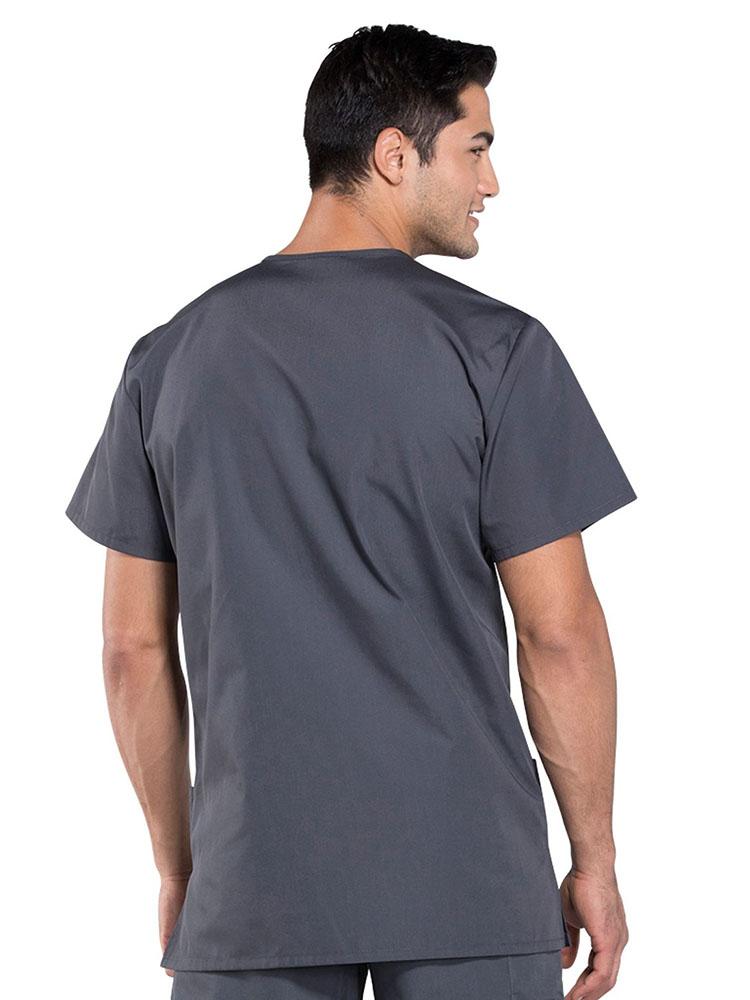 A male Radiologic Technologist showing the back of a Cherokee Workwear Originals Unisex Multi-pocket V-neck Scrub Top in Pewter size Large featuring a center back length of 29".