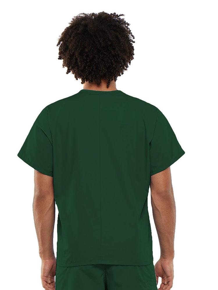 A young male Dental Assistant wearing a Cherokee Workwear Originals Unisex Single Pocket V-neck Scrub Top in Hunter size Large featuring a center back length of 27.5".